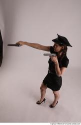 NIKITA POLICEWOMAN WITH TWO GUNS